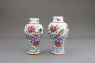 A Pair of 'famille rose'Chicken and peony Vases,