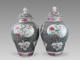 A Rare Pair of Carved 'famille rose' Jars and Covers, Yongzheng