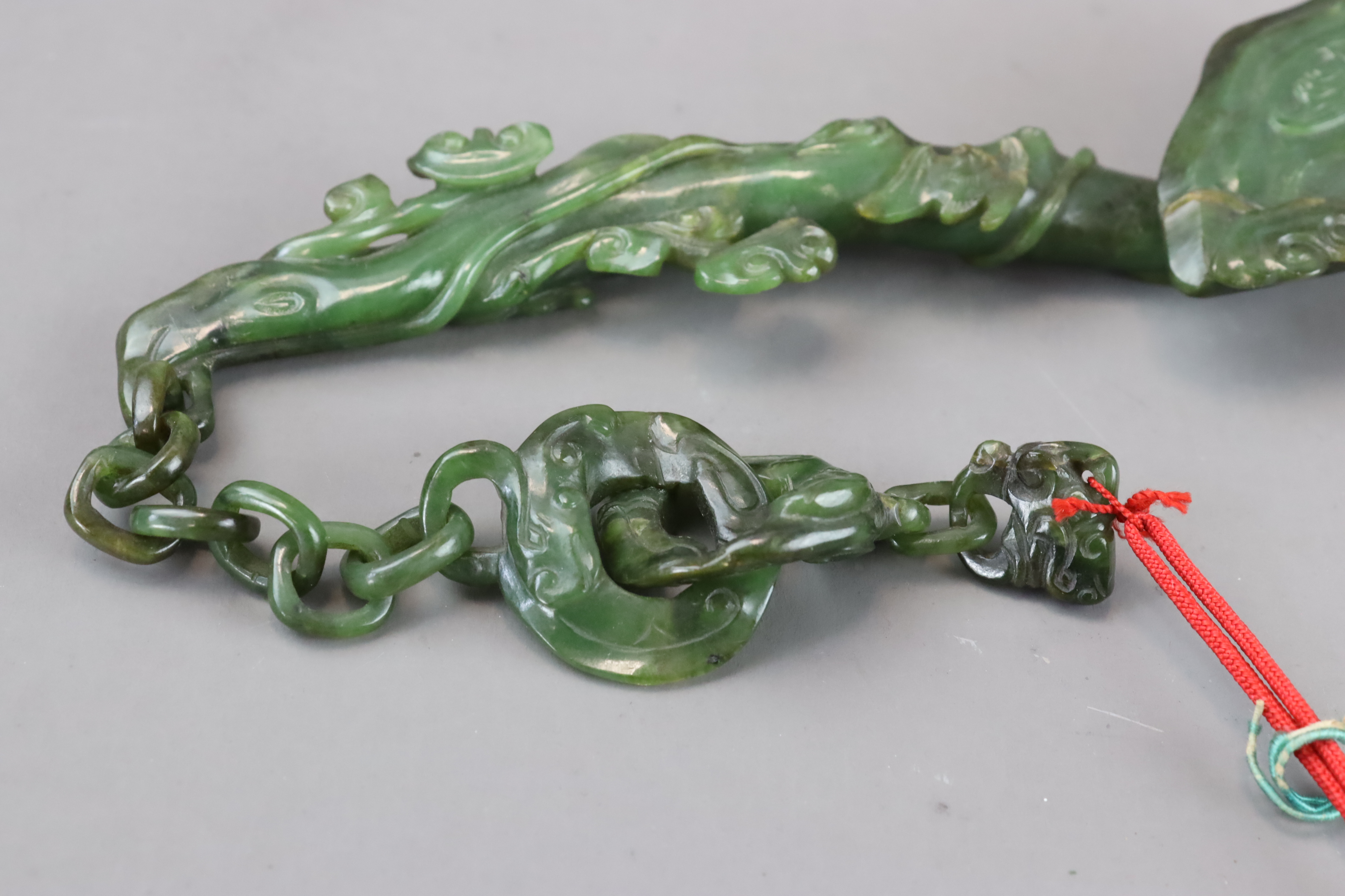 A Pair of Spinach Jade Ruyi Sceptres, c.1900 - Image 10 of 10