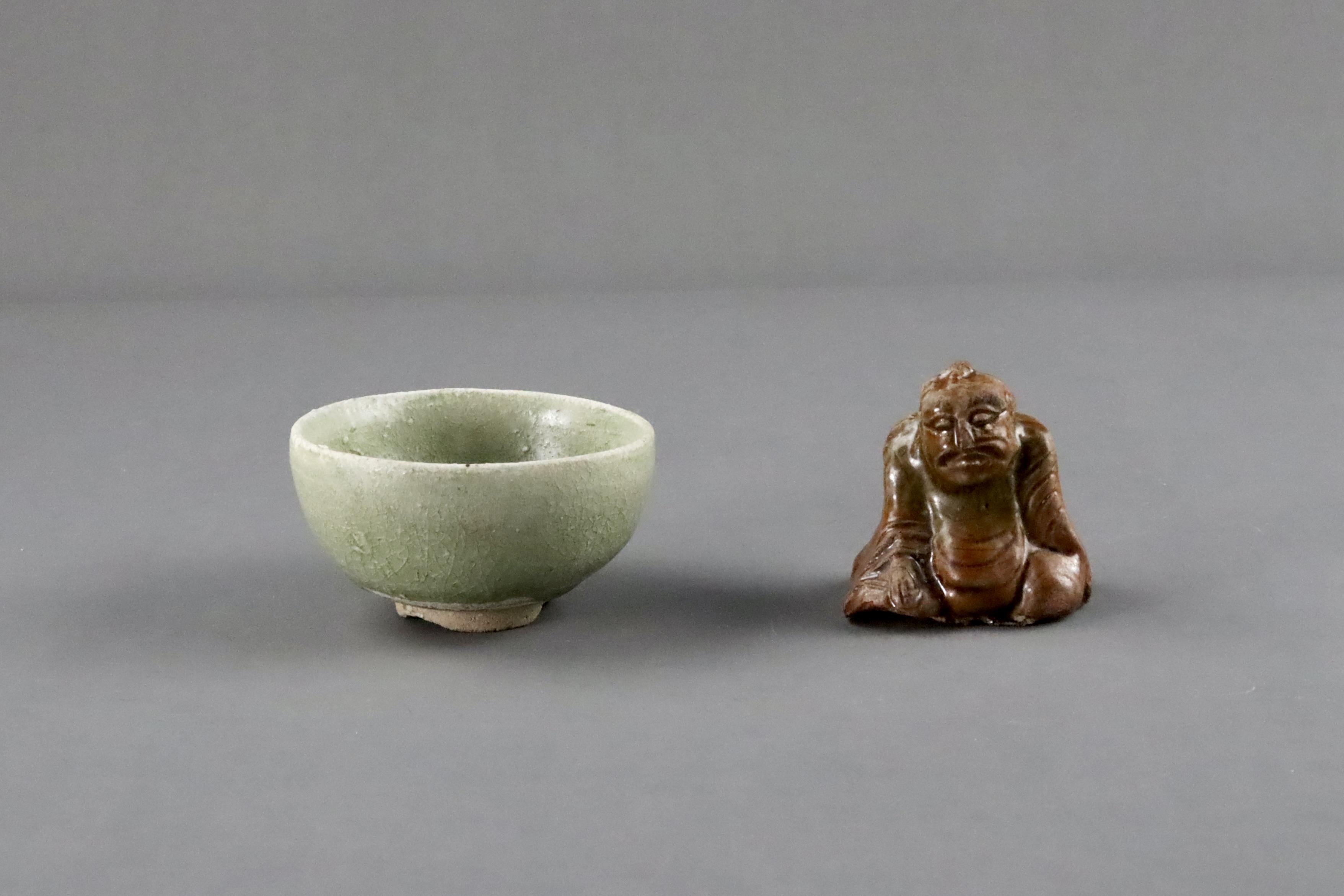 An Amber-glazed Figure and A Celadon Cup, Han dynasty and Sui dynasty - Image 2 of 9