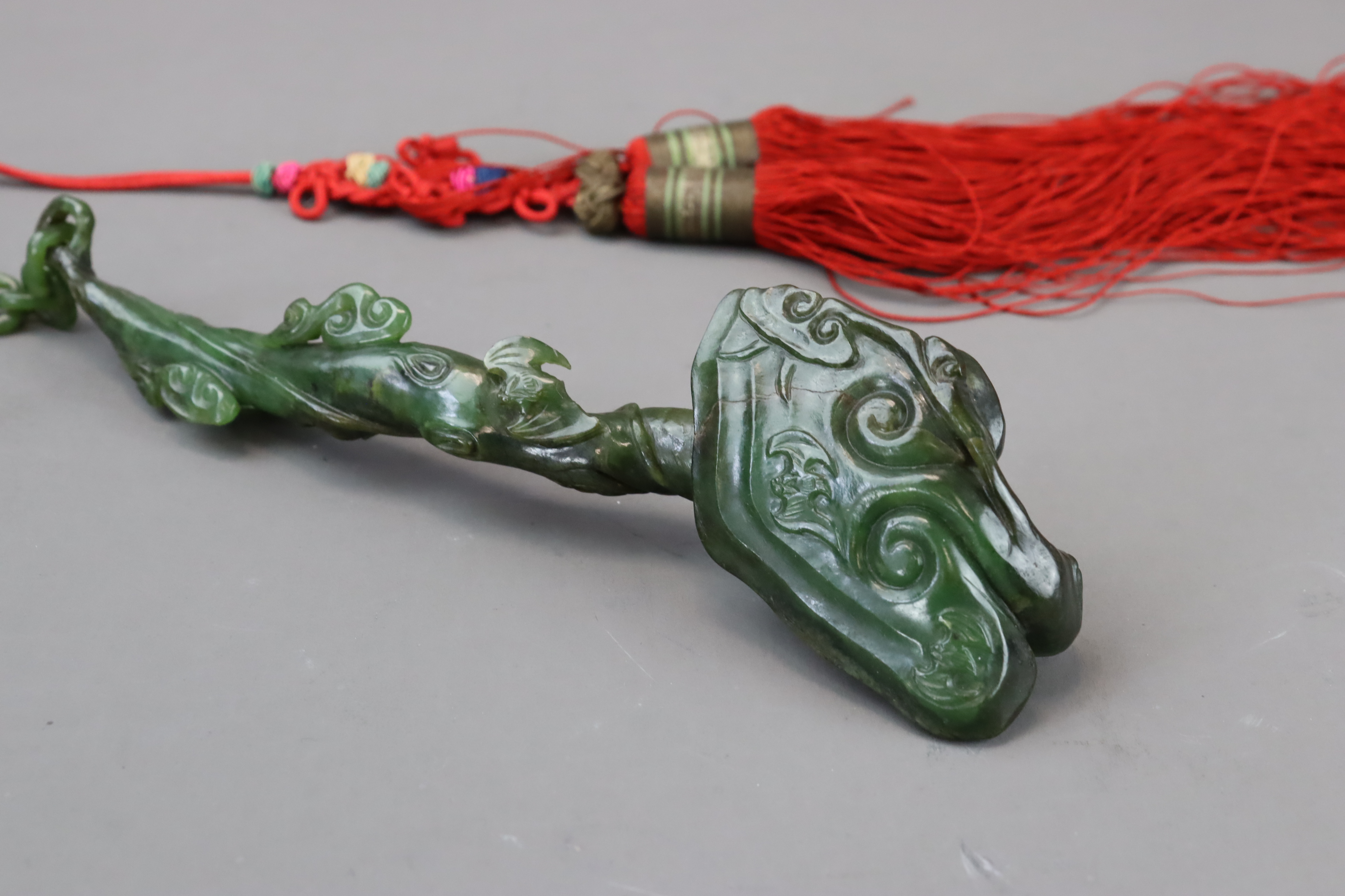 A Pair of Spinach Jade Ruyi Sceptres, c.1900 - Image 7 of 10