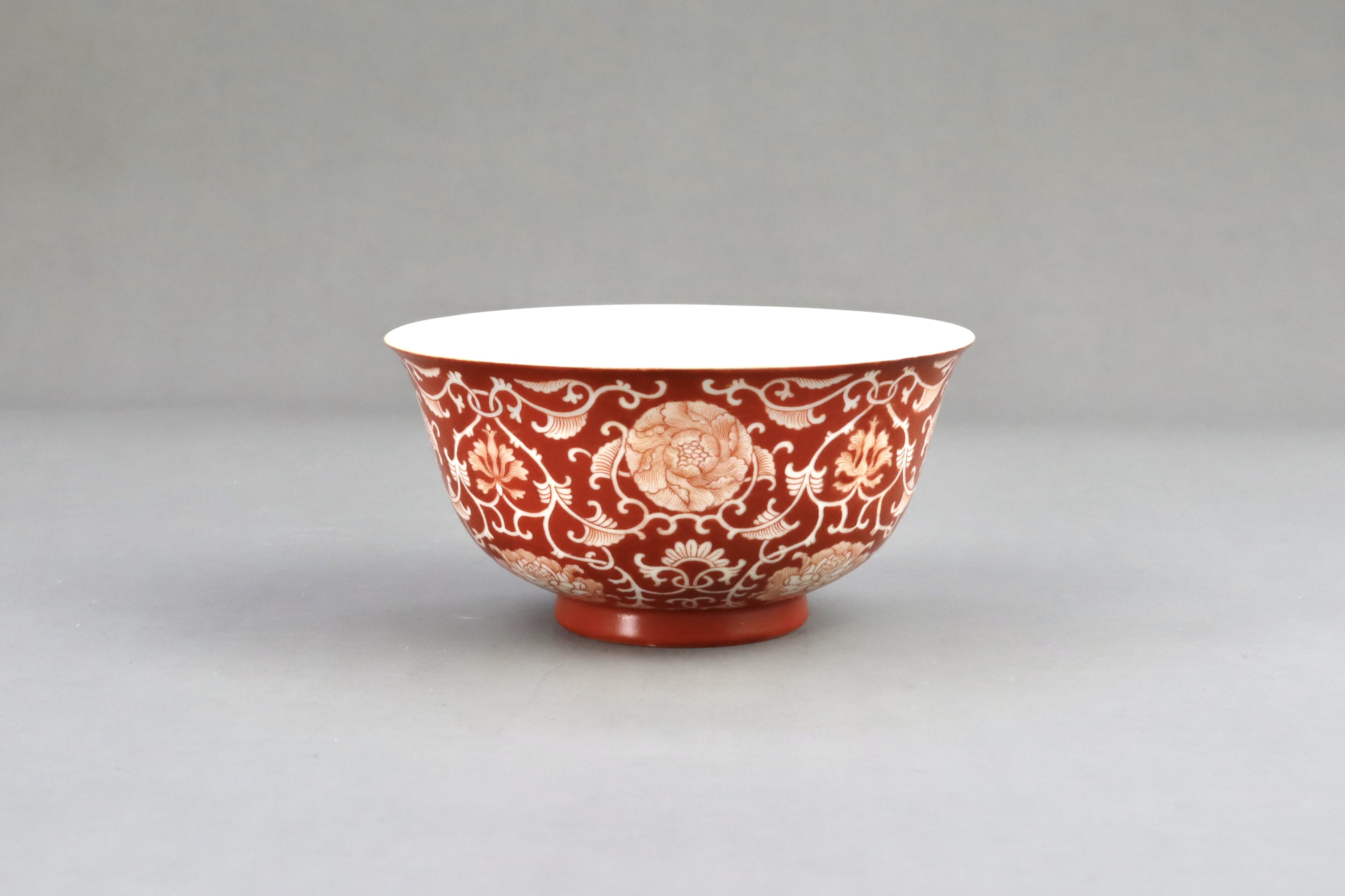 A Coral Ground Bowl with Scrolling Flowers, six character underglaze blue seal mark of Qianlong and  - Image 2 of 6