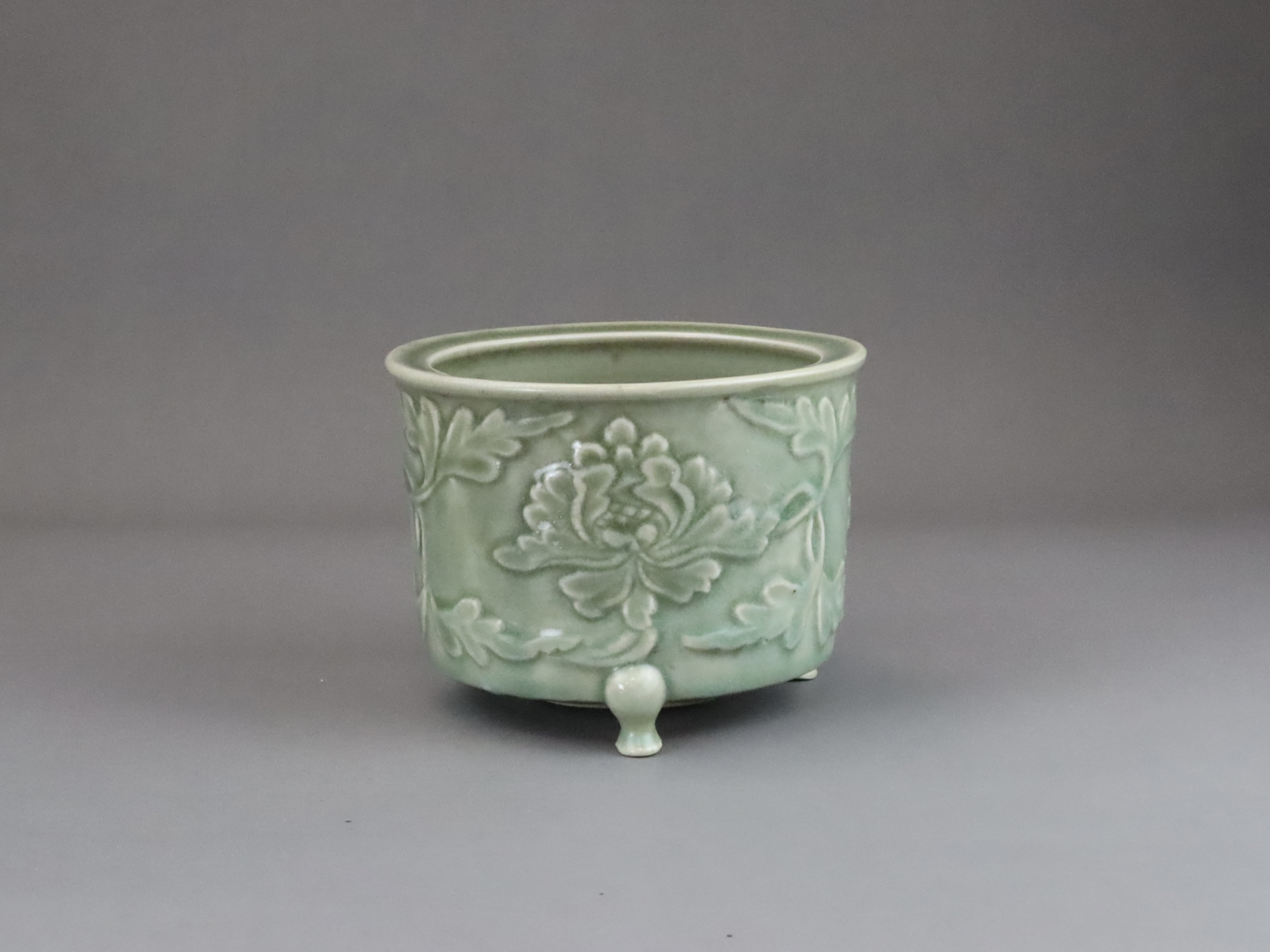 A Longquan Celadon Peony Tripod Censer, early Ming dynasty,  - Image 11 of 14