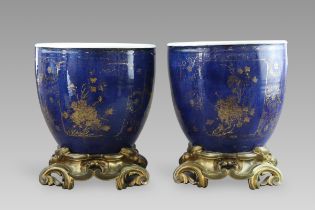 An Attractive Gilt decorated Pair of 'bleu souffle' Jardinieres, Kangxi, later mounted in French orm