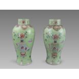 A Pair of Green-ground Famille-rose Floral Vases, 19th century