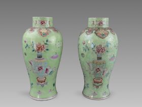 A Pair of Green-ground Famille-rose Floral Vases, 19th century