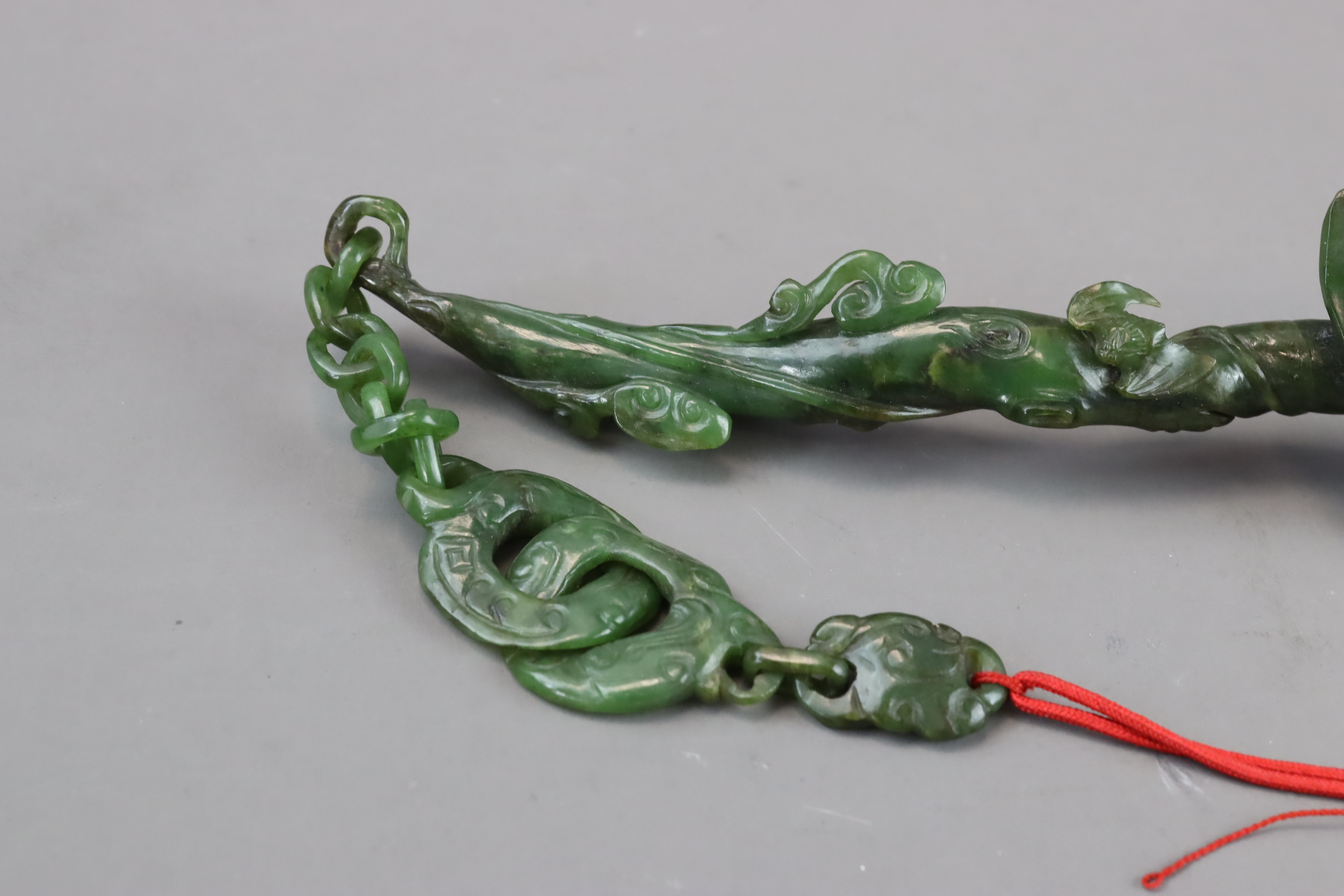 A Pair of Spinach Jade Ruyi Sceptres, c.1900 - Image 8 of 10