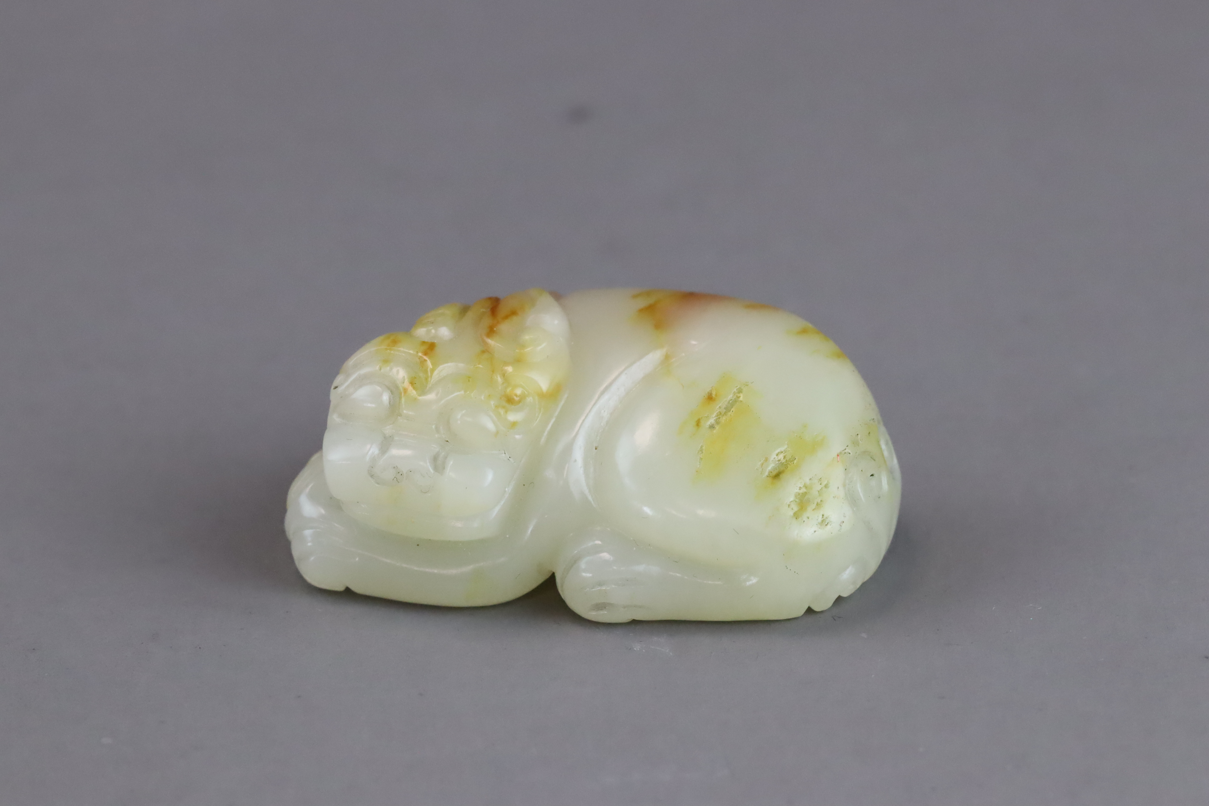 A Celadon Jade Seated Qilin, early Qing dynasty, - Image 3 of 10