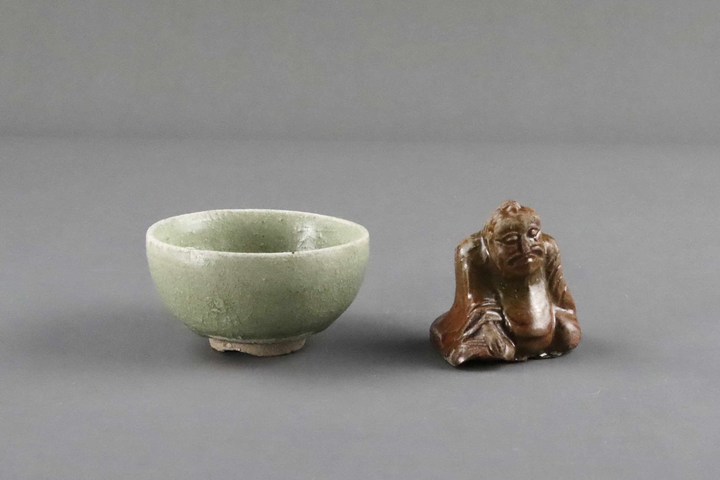 An Amber-glazed Figure and A Celadon Cup, Han dynasty and Sui dynasty - Image 6 of 9
