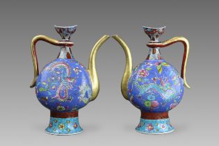 A Rare Pair of European decorated Ewers , Kangxi