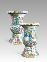 An Attractive Pair of Canton 'famille rose' Beaker Vases, early 19th century