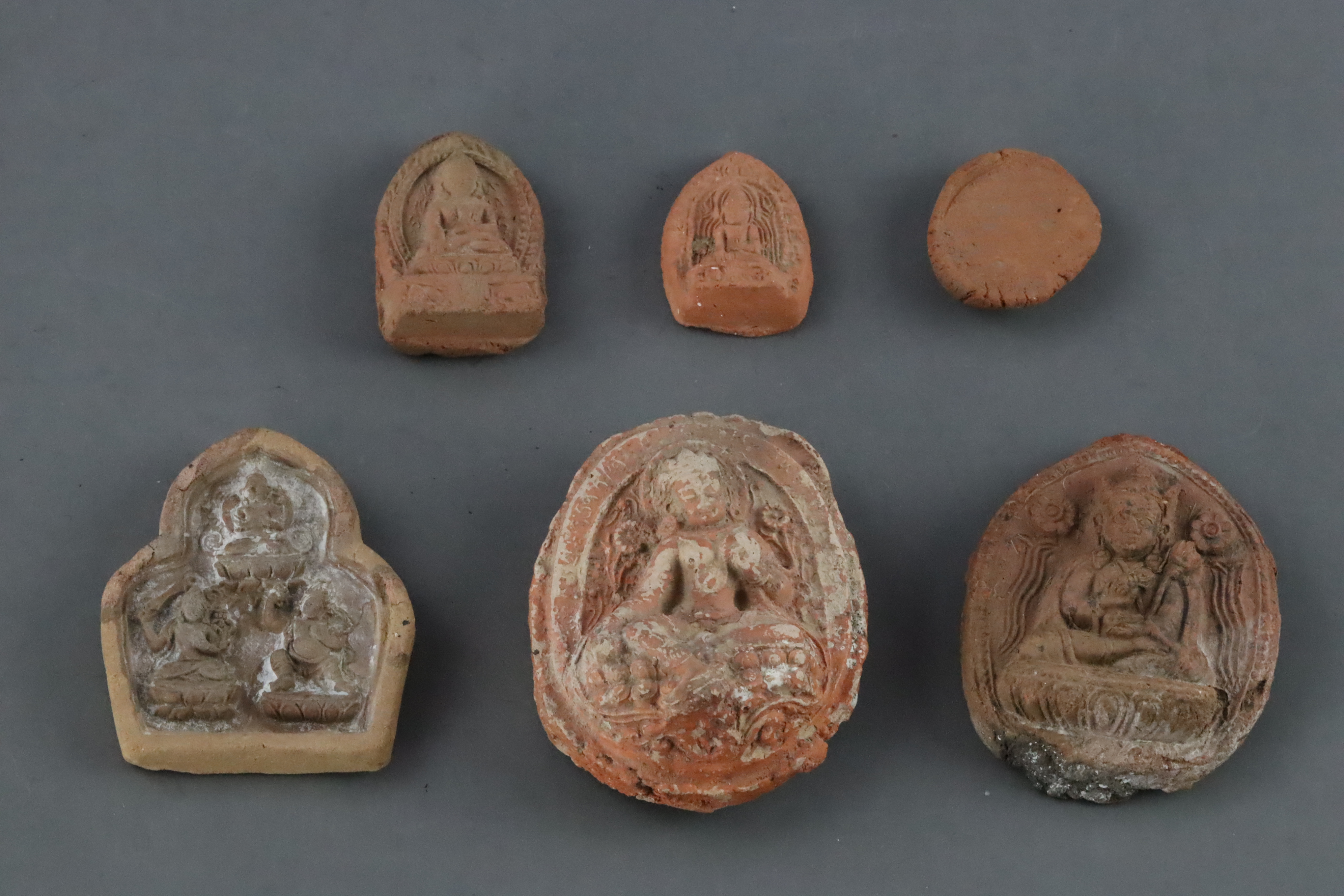Six moulded Pottery Tsa Tsa, Qing dynasty, A Miniature Bronze seated Bodhisattvas, and a copper Gau, - Image 6 of 18