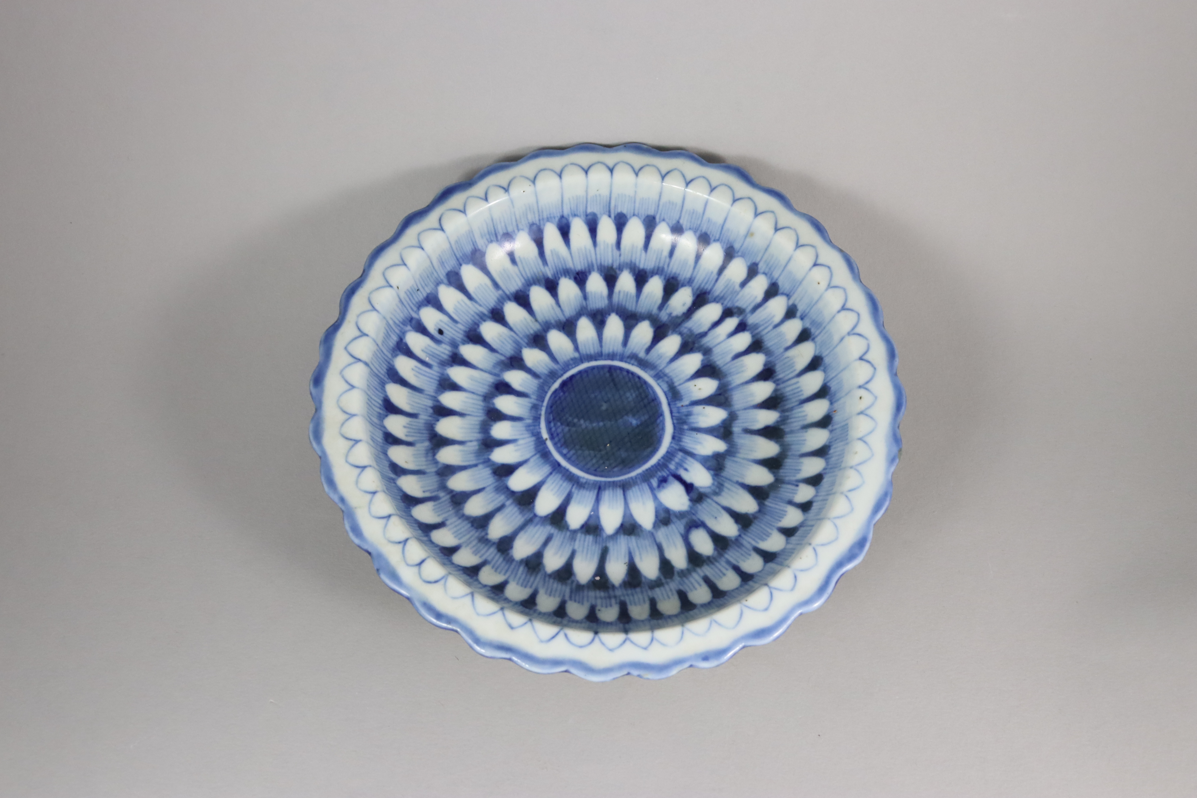 A Blue and White Moulded Dish, 19th century, 