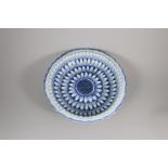 A Blue and White Moulded Dish, 19th century, 