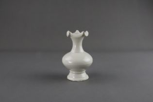 A Rare Ding-type White-glazed Foliate-rim Vase, Song dynasty