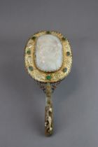 A Good Jade-Set Gilt Metal Mirror, c.1900, the jade 18th century