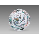 An exquisite 'famille verte' Floral Dish, Kangxi