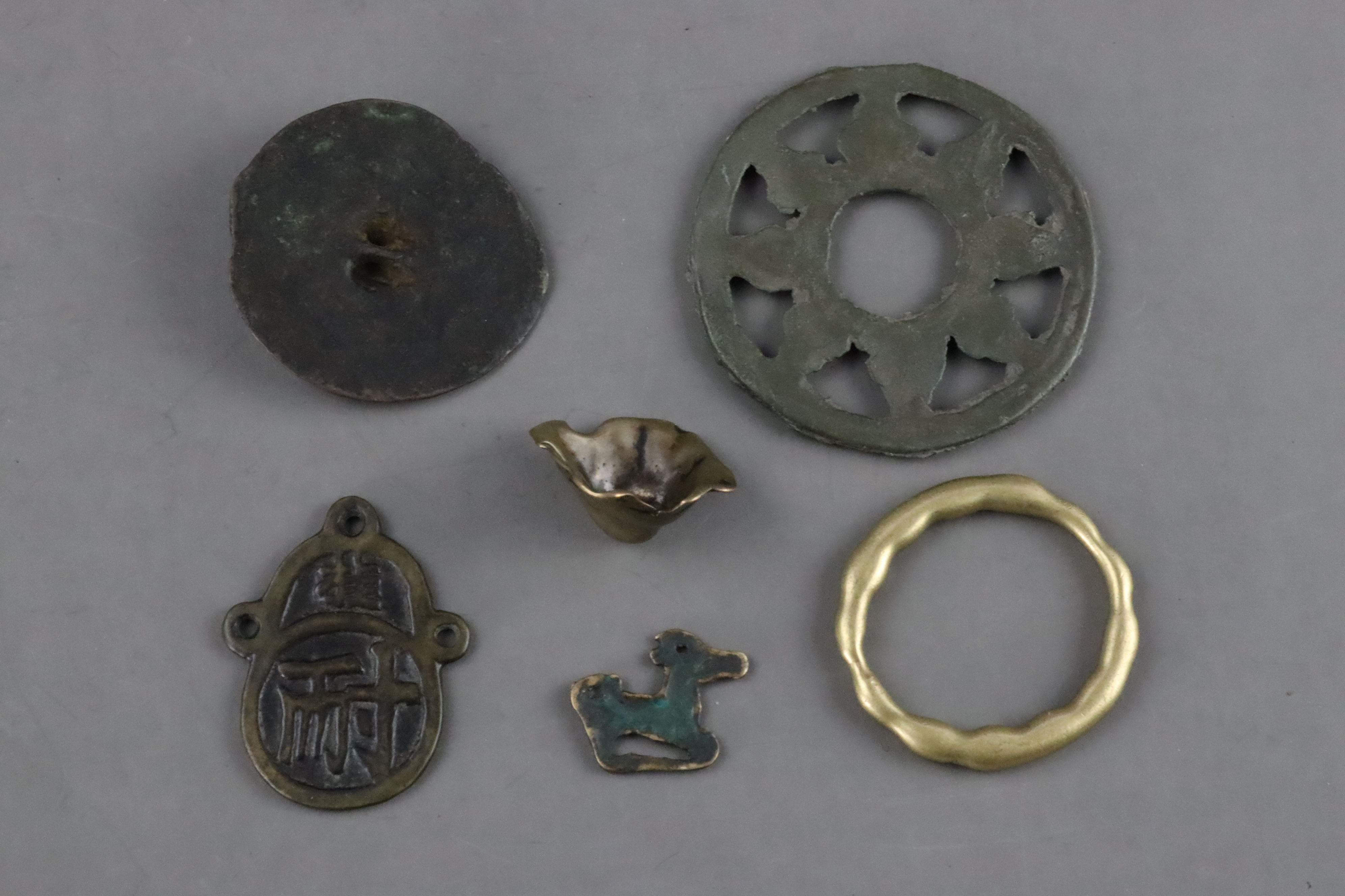 Six Small Bronzes, mainly Tibetan, 19th century and earlier, - Image 2 of 7