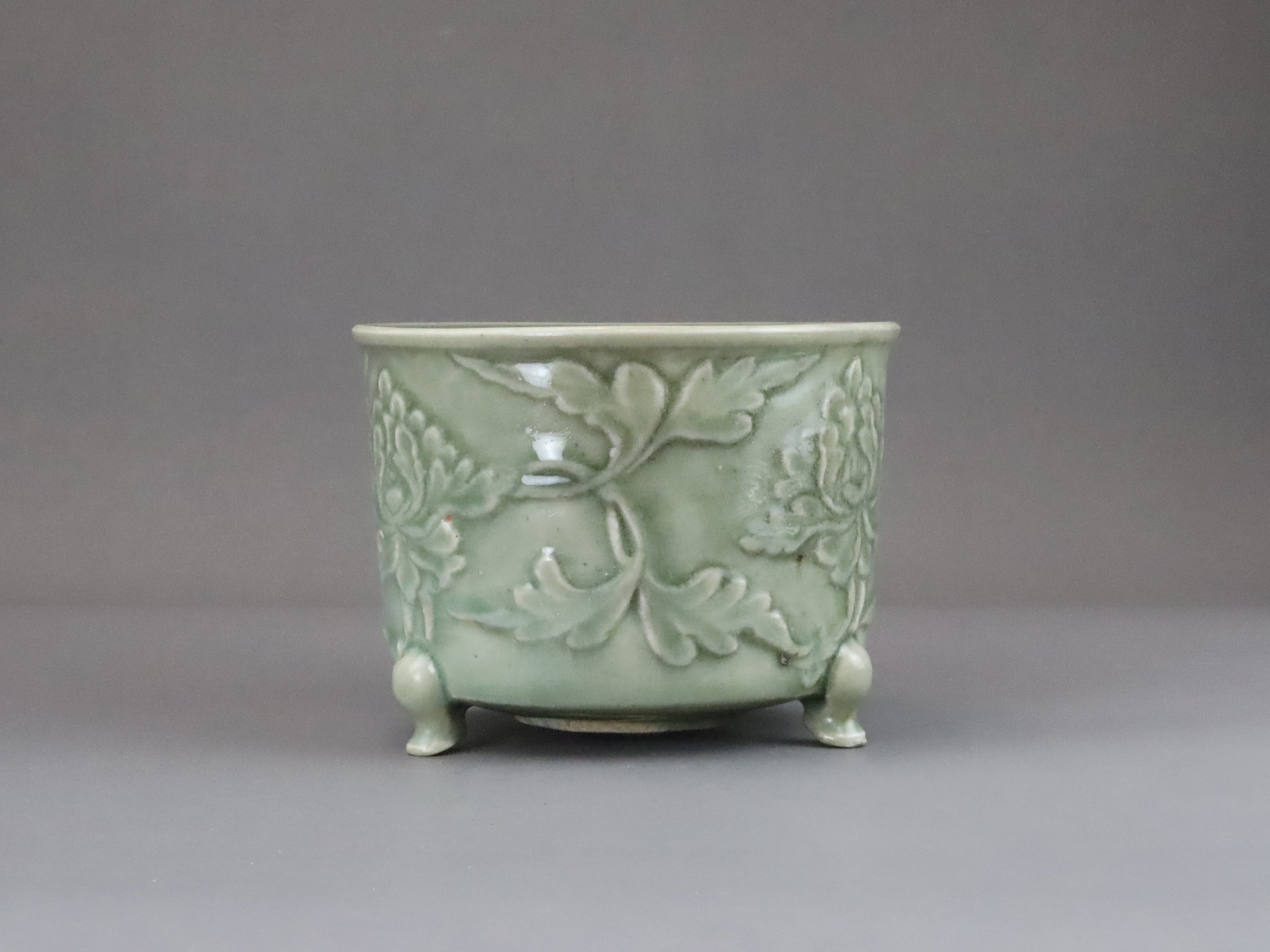 A Longquan Celadon Peony Tripod Censer, early Ming dynasty,  - Image 6 of 14