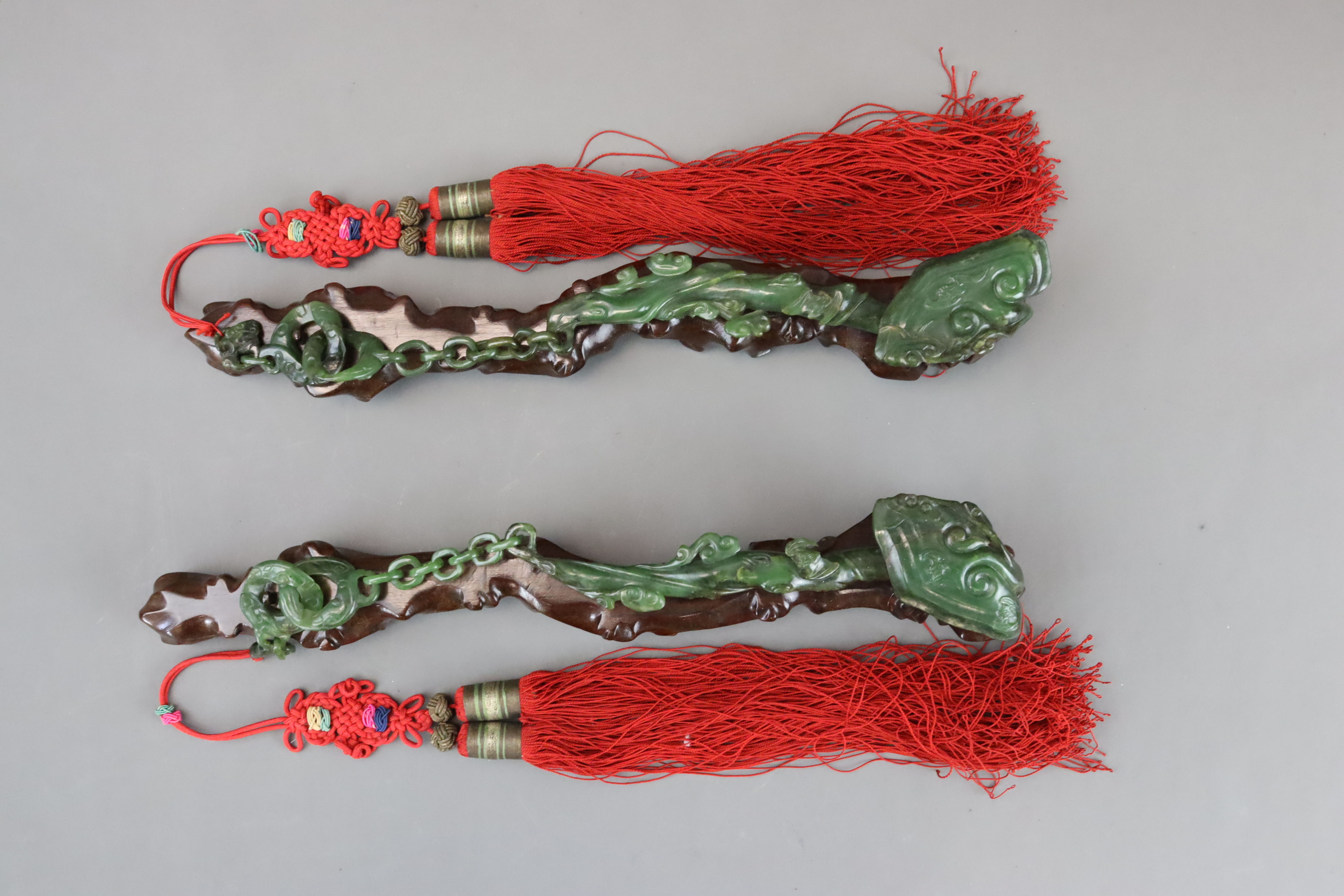 A Pair of Spinach Jade Ruyi Sceptres, c.1900 - Image 4 of 10