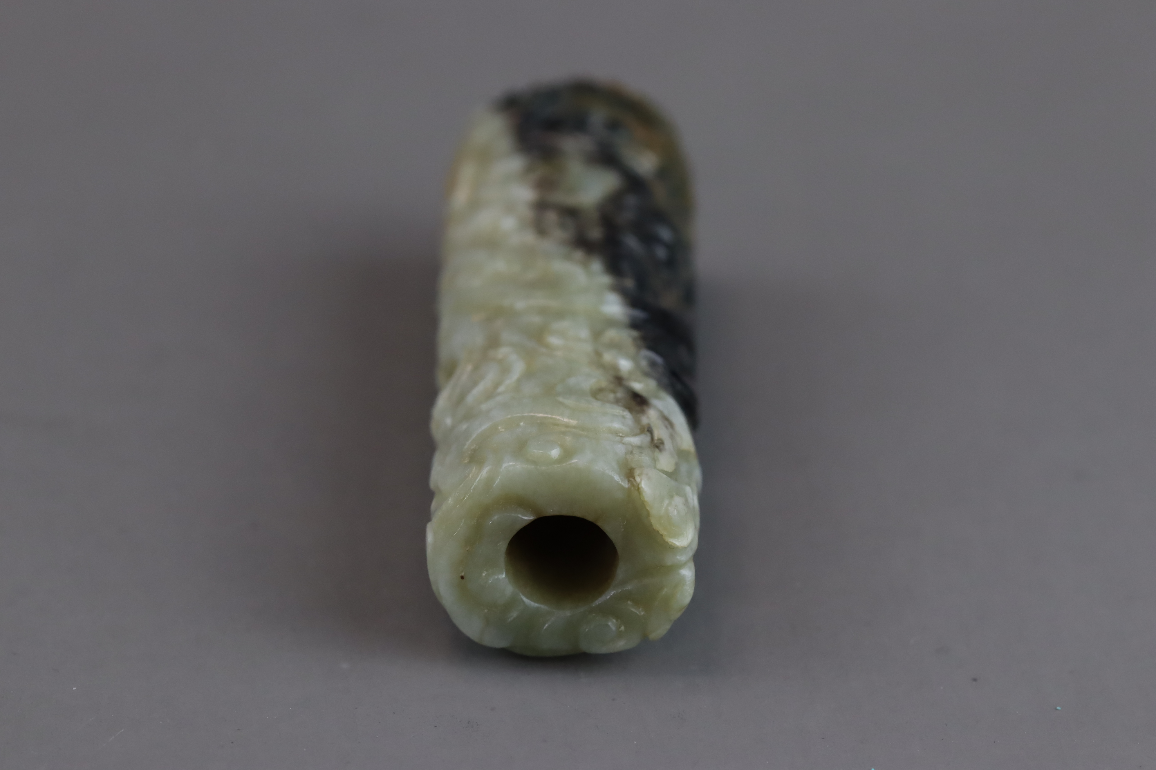 A Black and Celadon Jade Cylinder carved with  Chilong, Ming dynasty - Image 4 of 9