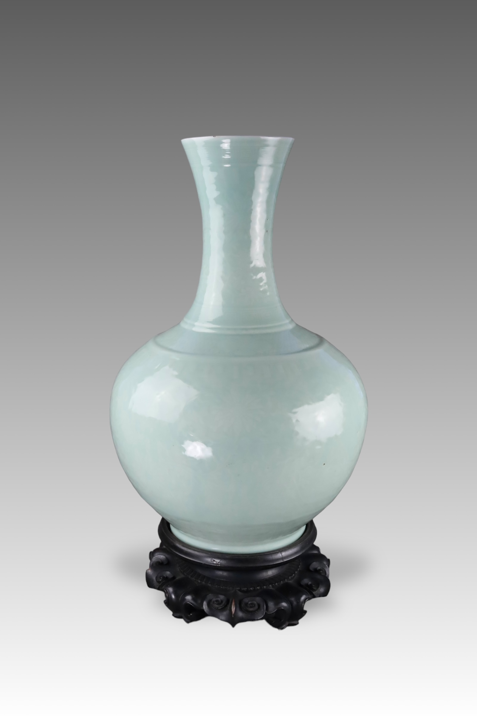A Large Carved Celadon Bottle Vase, Tianqiuping, 19th century