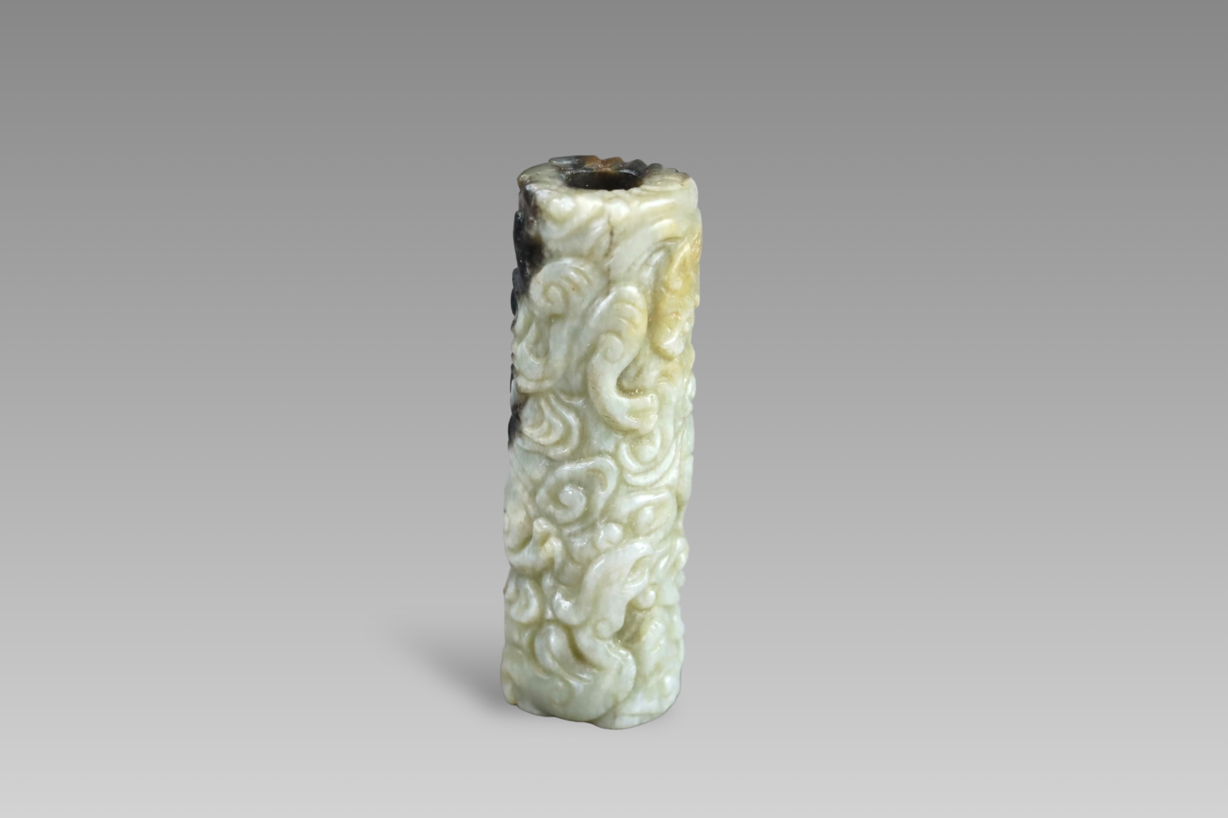 A Black and Celadon Jade Cylinder carved with  Chilong, Ming dynasty