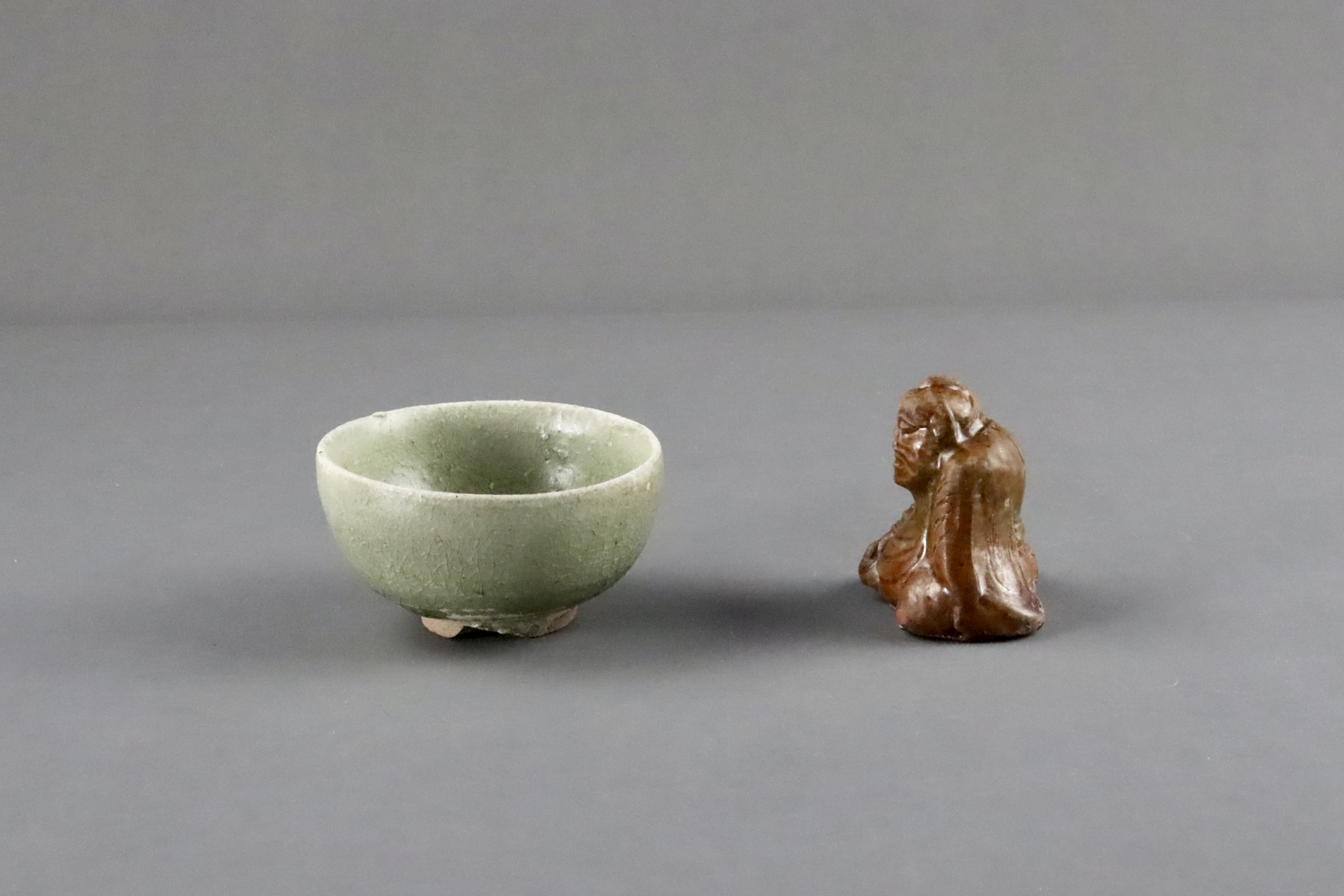 An Amber-glazed Figure and A Celadon Cup, Han dynasty and Sui dynasty - Image 3 of 9