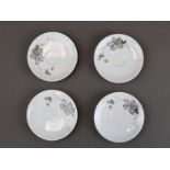 Four Famille-rose Floral Saucers, dated 1961