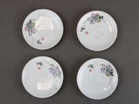 Four Famille-rose Floral Saucers, dated 1961