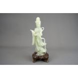A Pale Celadon Jade Guanyin, 19/20th century,