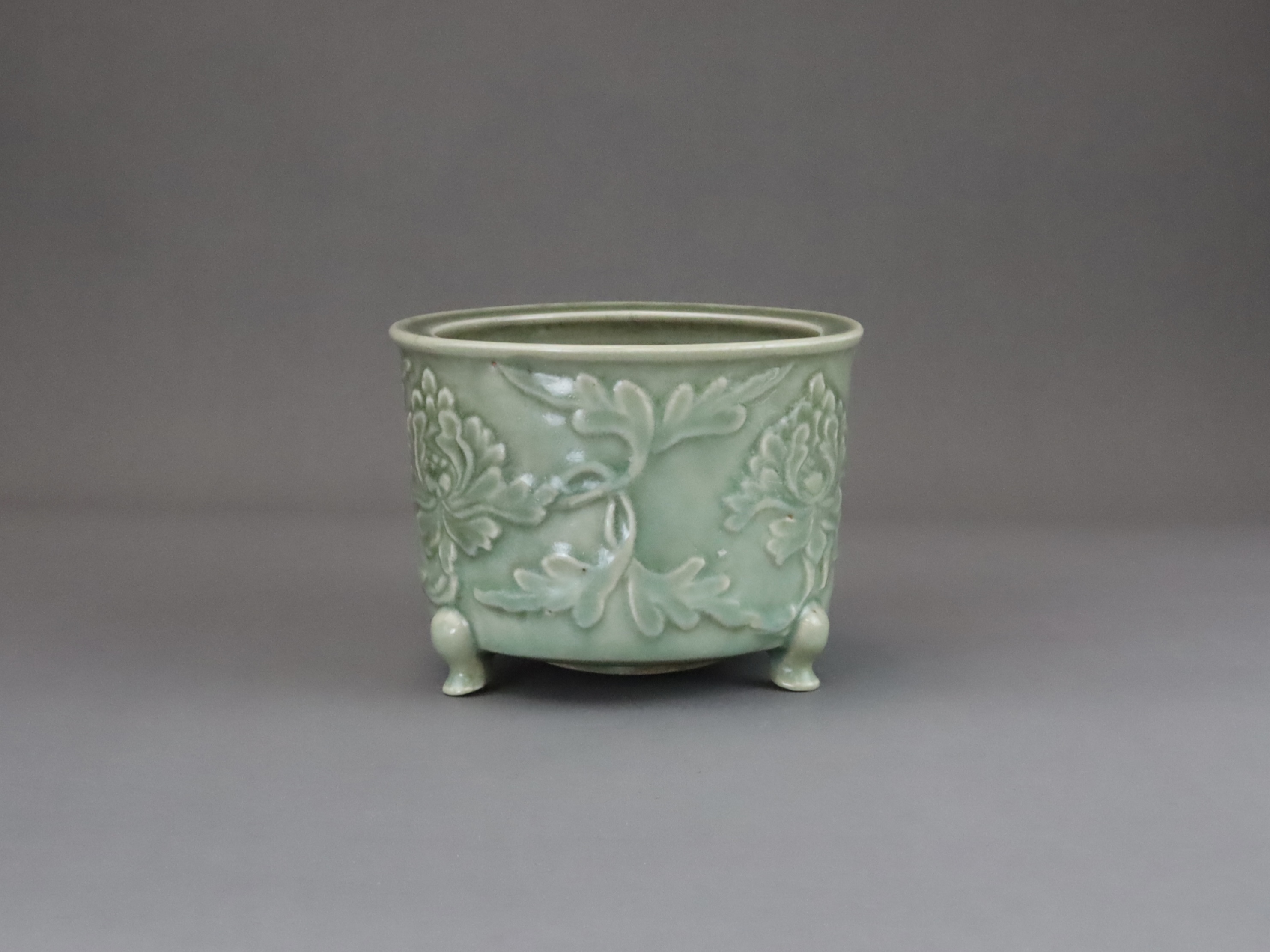 A Longquan Celadon Peony Tripod Censer, early Ming dynasty,  - Image 2 of 14