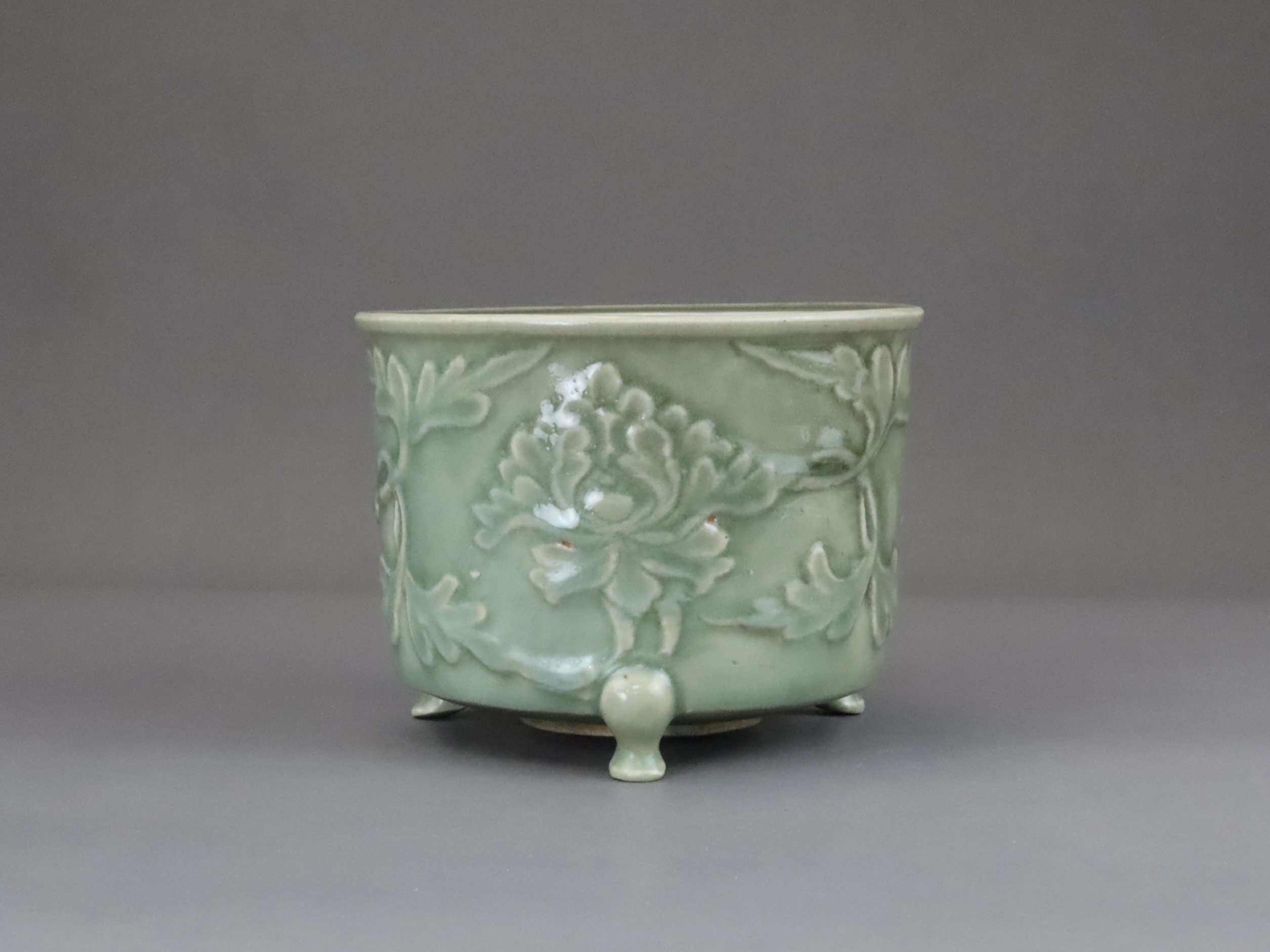 A Longquan Celadon Peony Tripod Censer, early Ming dynasty,  - Image 5 of 14