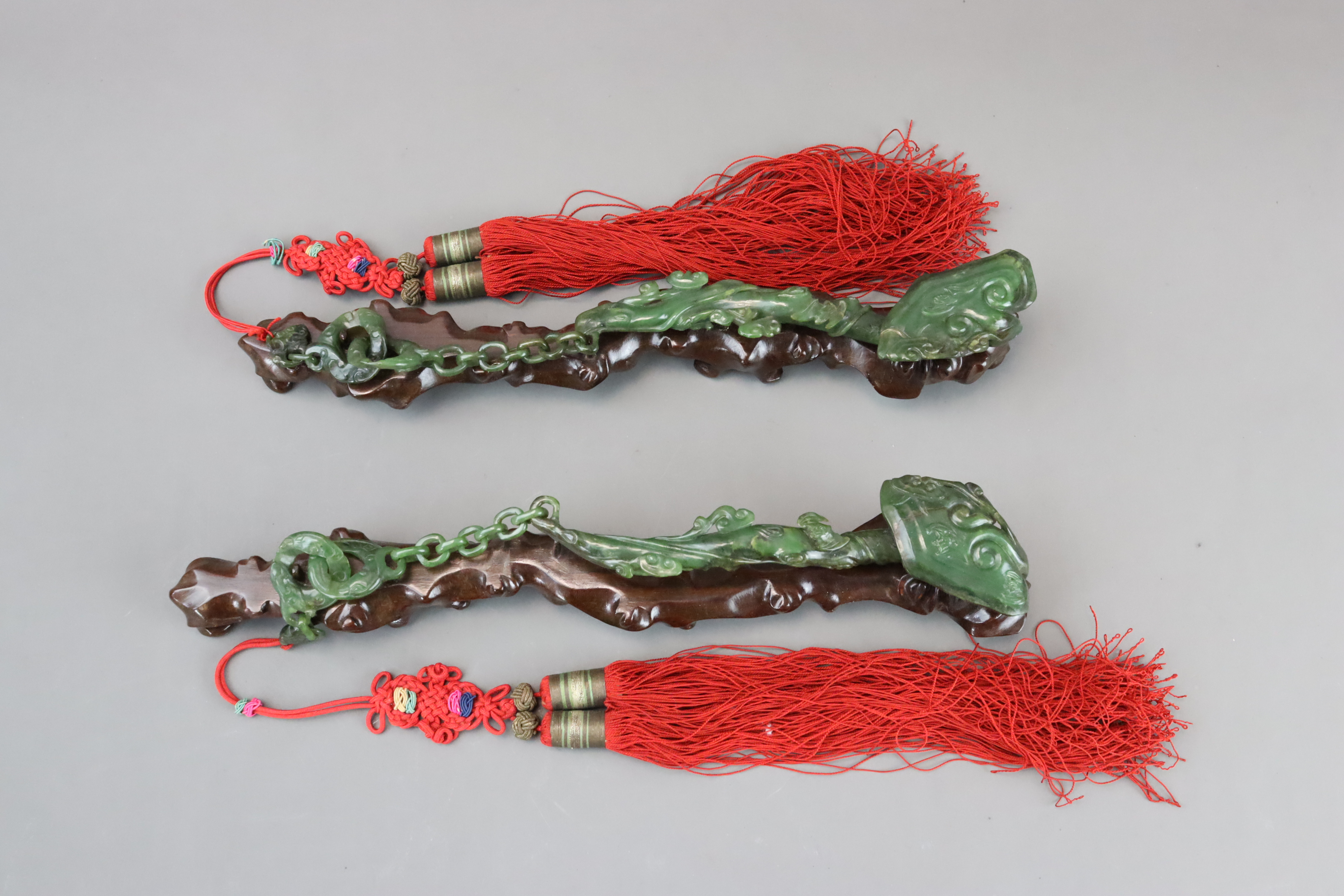 A Pair of Spinach Jade Ruyi Sceptres, c.1900 - Image 3 of 10