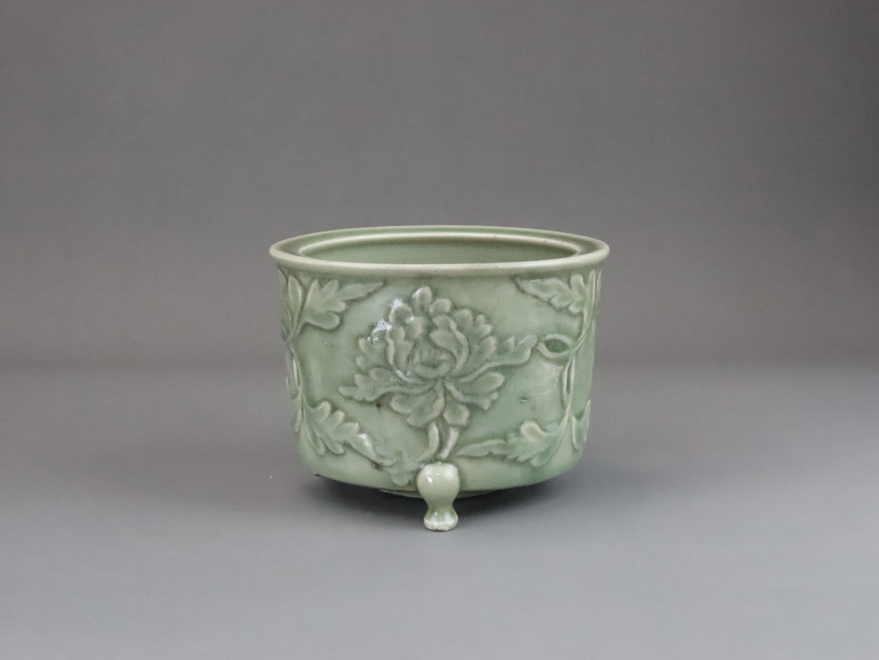 A Longquan Celadon Peony Tripod Censer, early Ming dynasty,  - Image 9 of 14