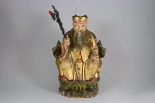 A Giltwood seated Sage, 19/20th century