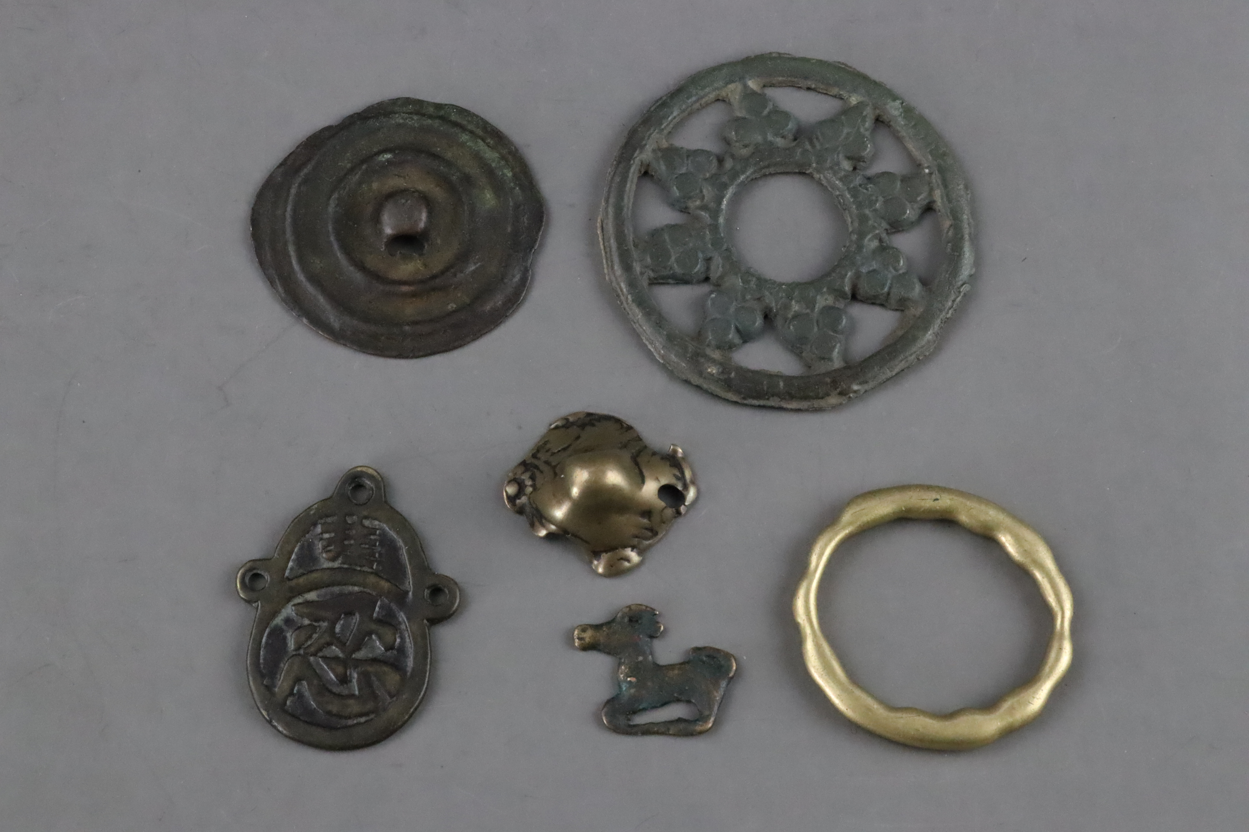 Six Small Bronzes, mainly Tibetan, 19th century and earlier,