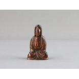 A Rare Lacquered Jade seated Guanyin, Ming dynasty or earlier,