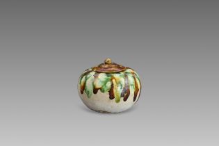 A Sancai-glazed Pottery Waterpot and Cover, Tang dynasty
