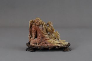 A Seated Soapstone Lohan, c.1900,