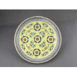 A Yellow ground famille rose Dish, six character underglaze blue mark of Guangxu and of the per