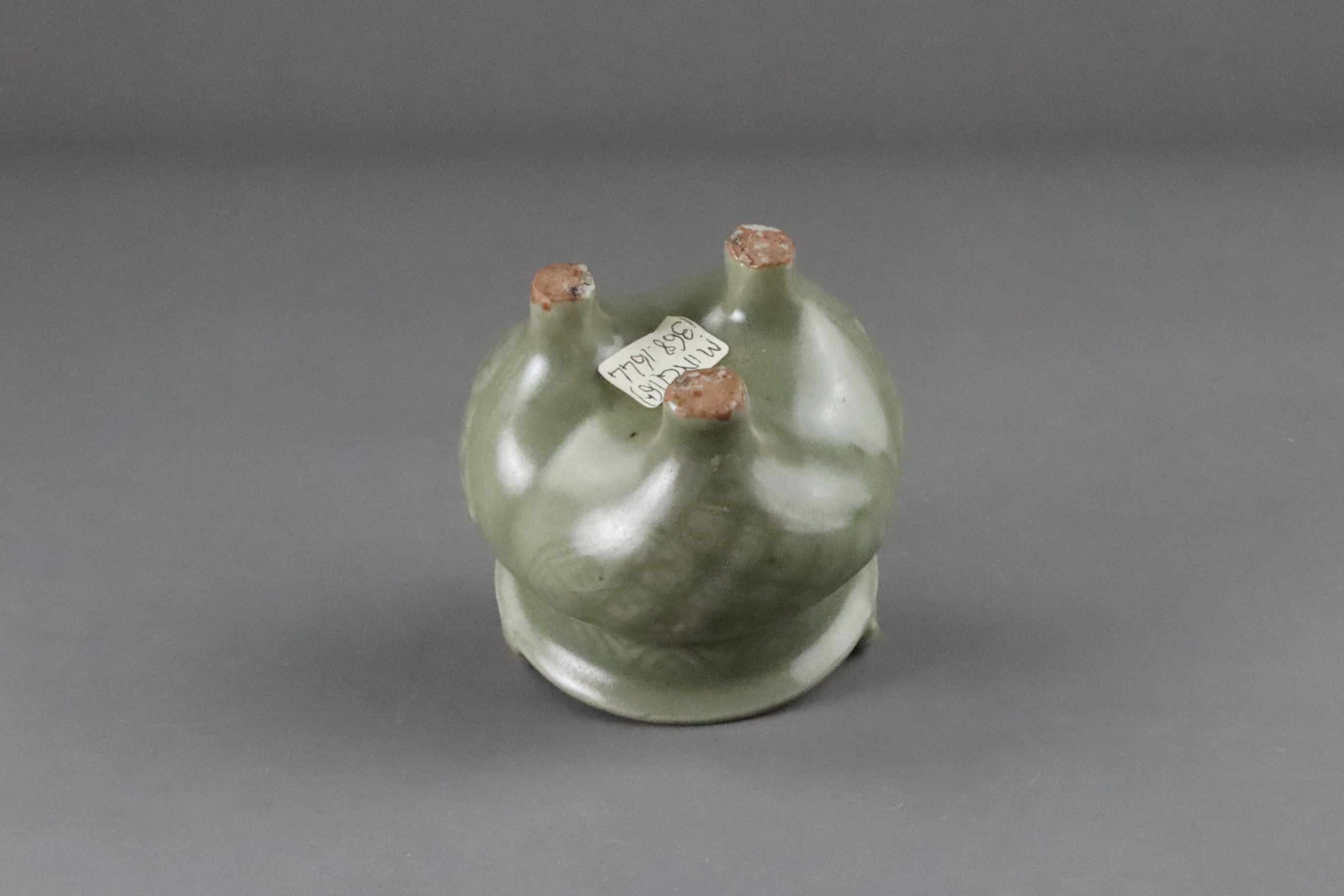 A Carved Longquan Celadon Tripod Incense Burner, early Ming dynasty - Image 11 of 11