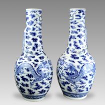 A Large Pair of Blue and White Dragon Bottles, 19th century