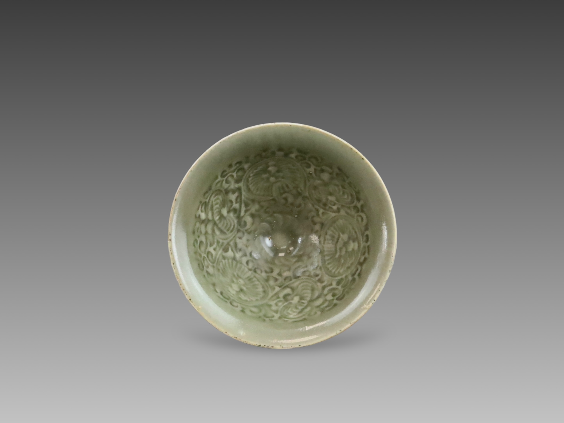 A Yaozhou Moulded Chrysanthemum Conical Bowl, Song dynasty, 