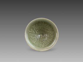 A Yaozhou Moulded Chrysanthemum Conical Bowl, Song dynasty,