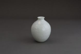 A White glazed Moulded Miniature Jar, Republic period,