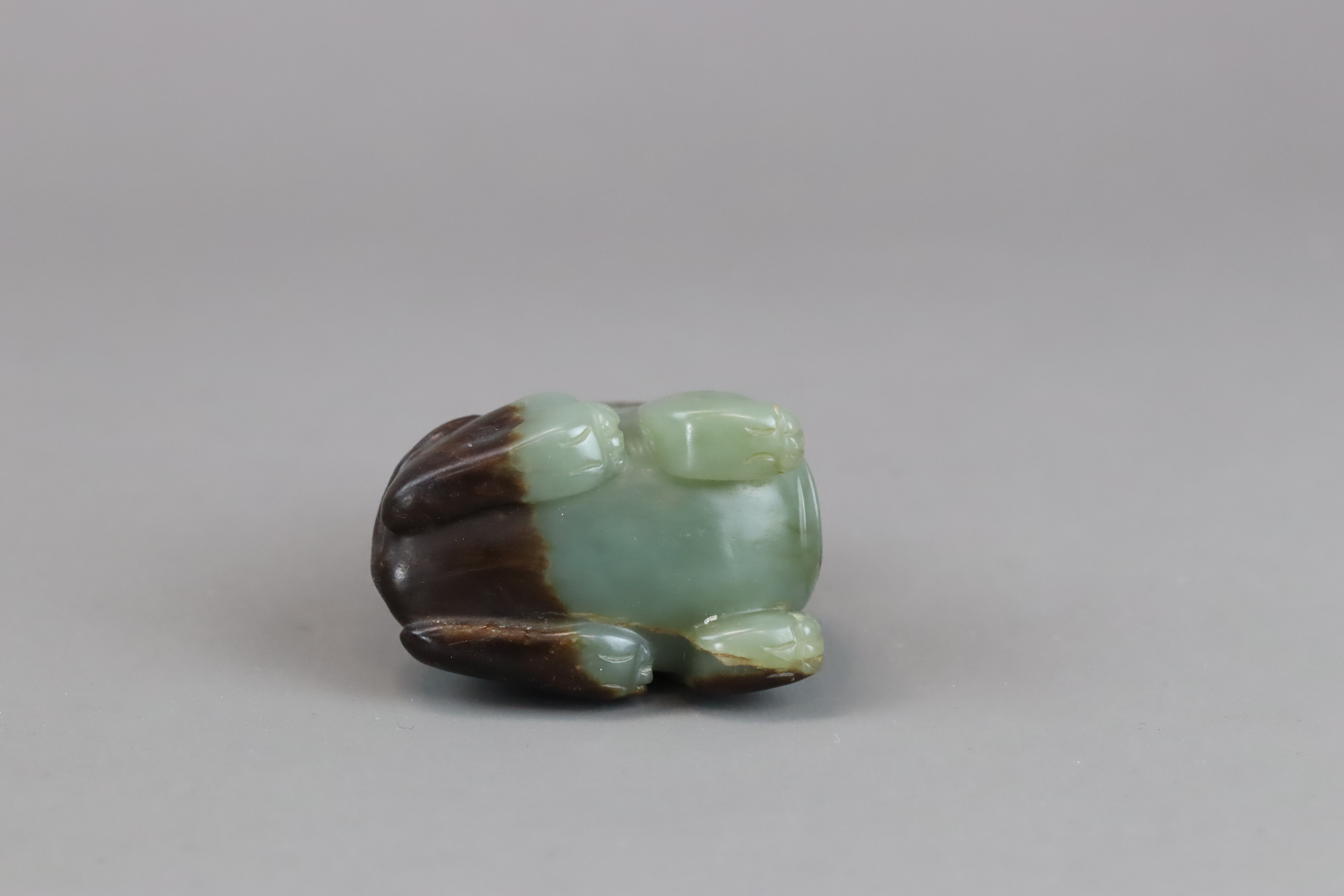 A Green and Brown Jade Seated Lion, Ming dynasty, - Image 9 of 10