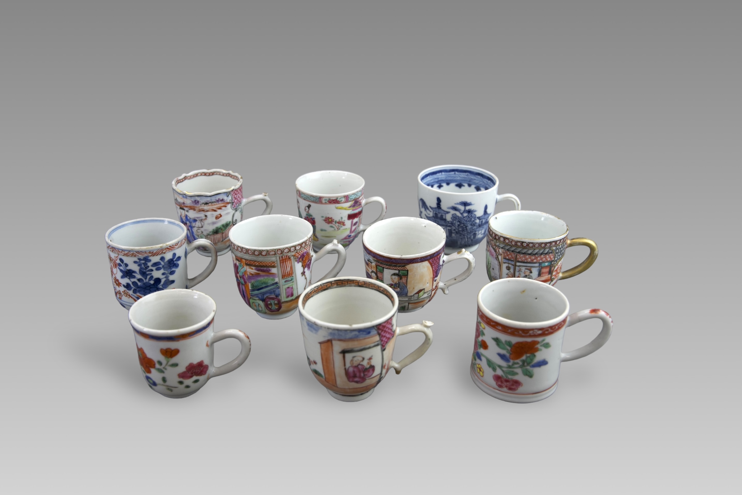 A Set of 10 Blue and White and 'famille rose' Coffee Cups, 18th century