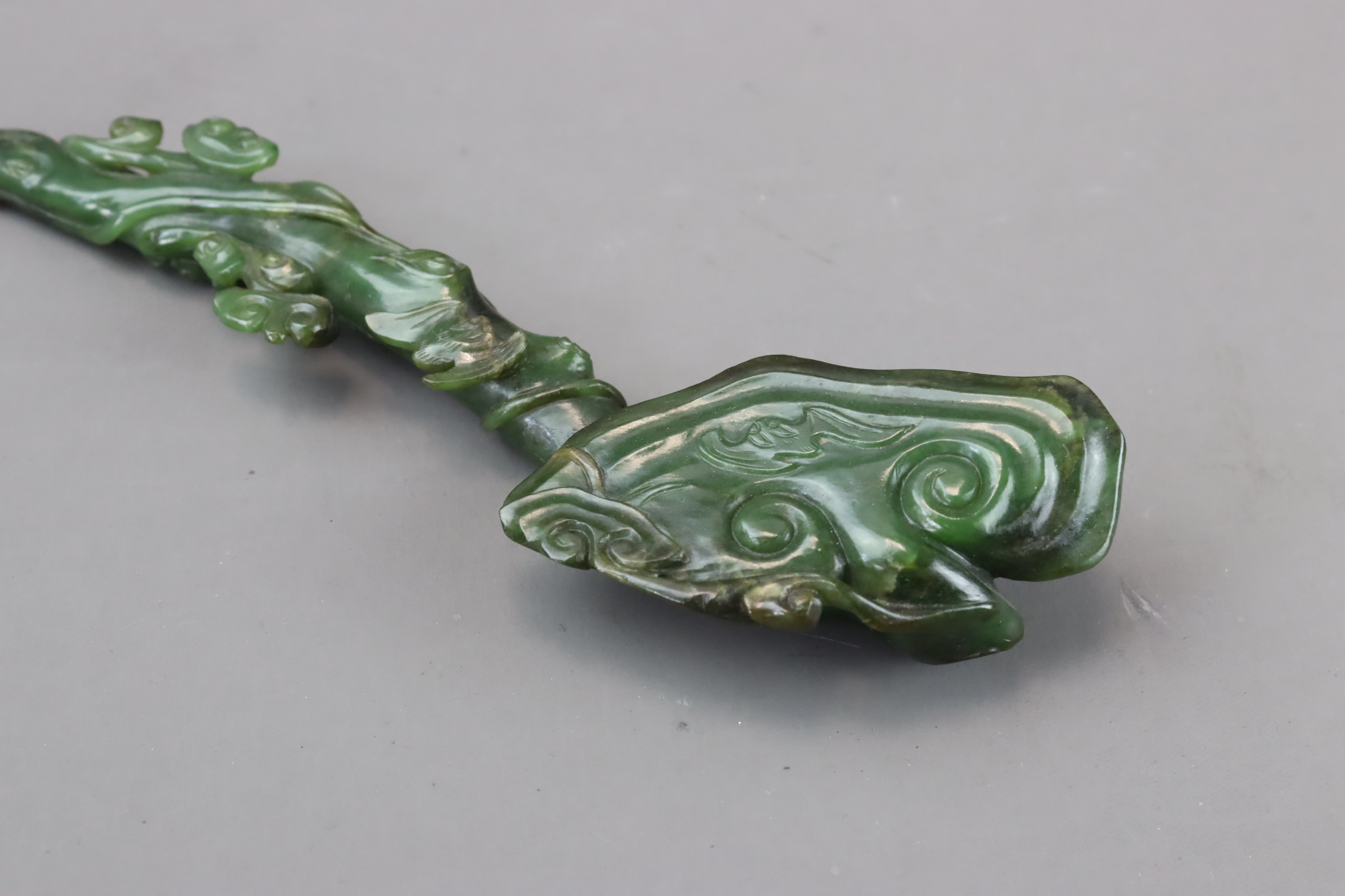 A Pair of Spinach Jade Ruyi Sceptres, c.1900 - Image 9 of 10