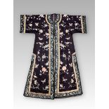 A Blue ground Lady's Robe embroidered with Butterflies, c.1900,